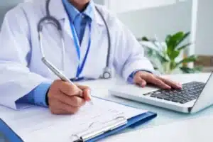 A doctor is doing some research.